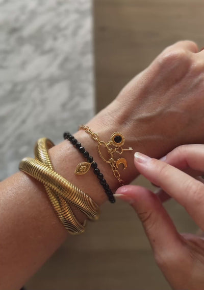 Vidéo bracelet or recyclé 18 carats maille ovale et trois breloques Onyx Noir médaillon clé lune Les Signes